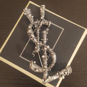 YSL brooch